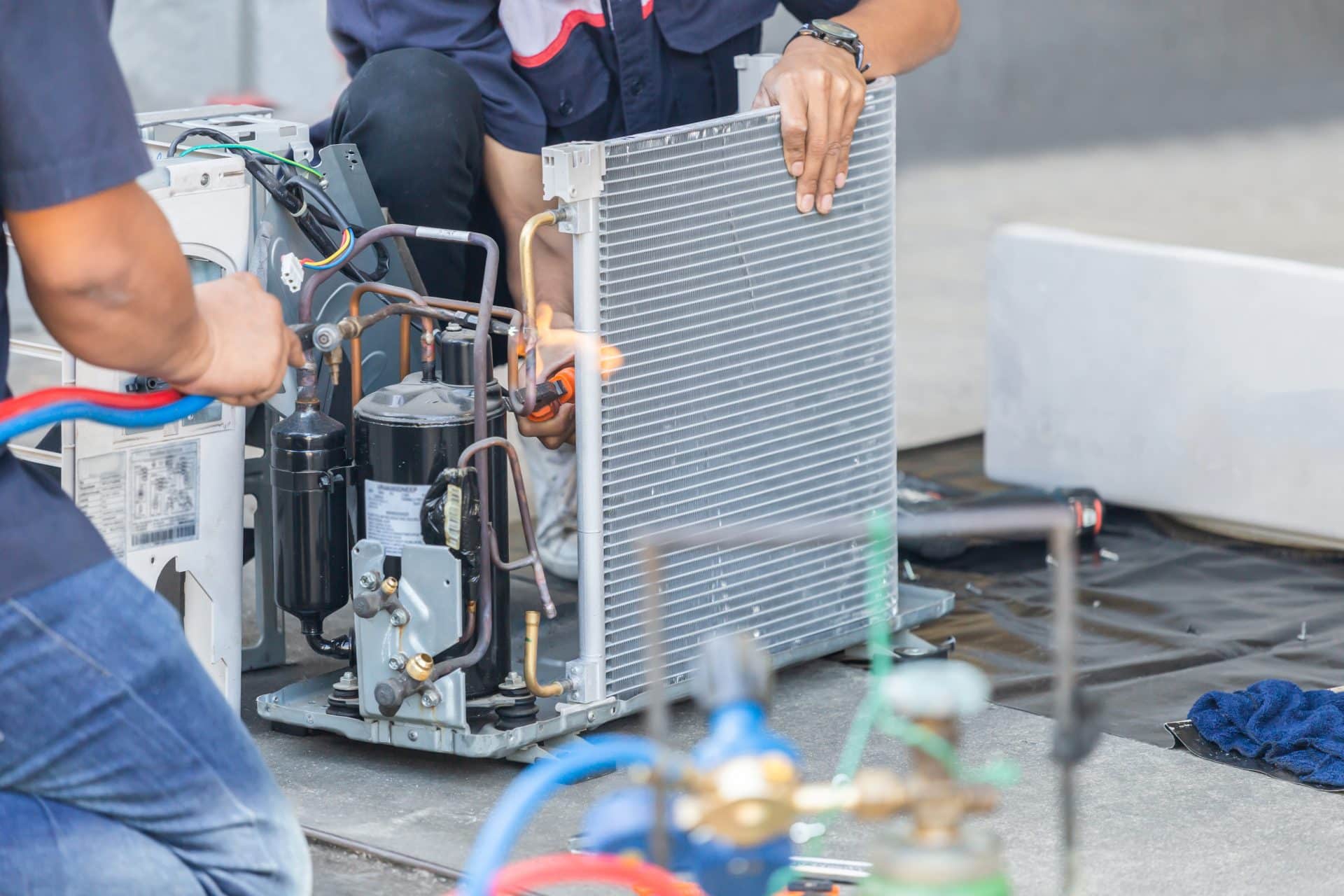 Close up of Air Conditioning Repair team use fuel gases